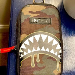 A lil Hurley bag for like money and small toys